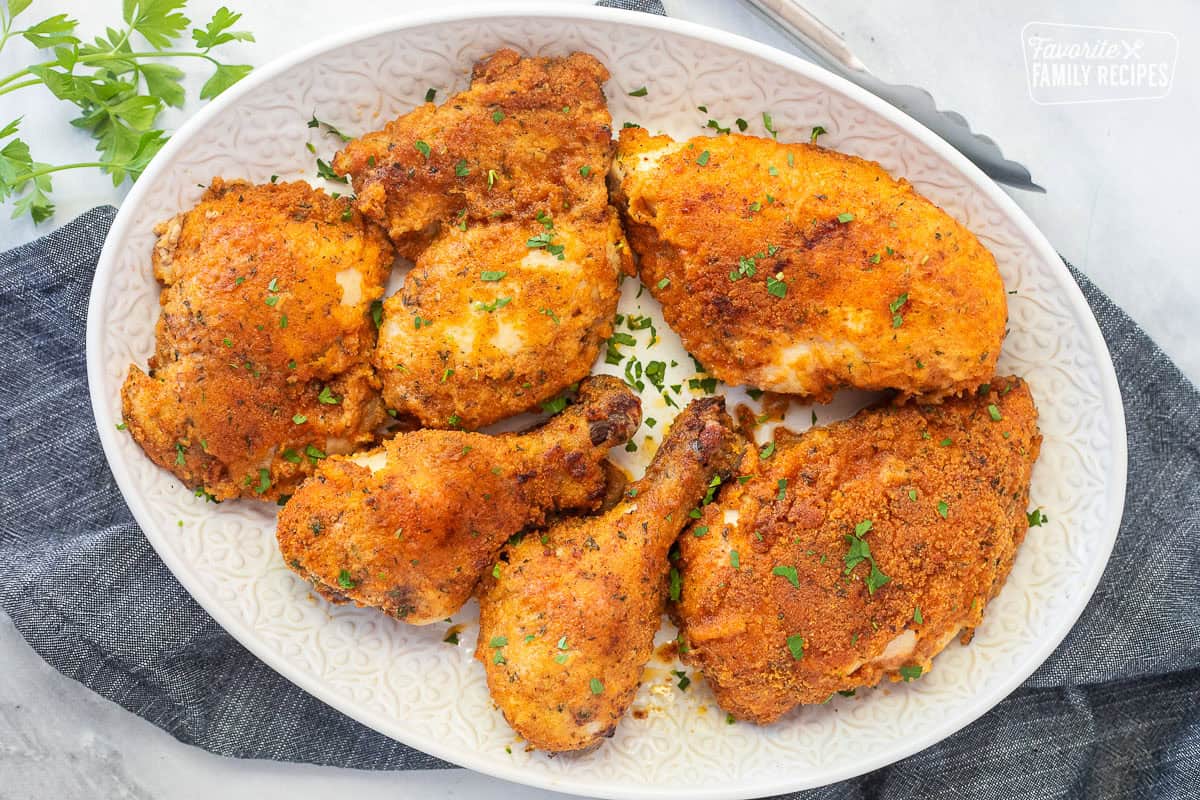 Shake and bake chicken on a platter.