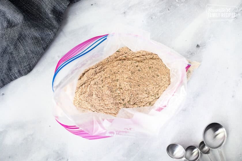 Ziplock bag with breadcrumbs and seasonings combined.