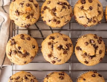 Banana Chocolate Chip muffins on a cooling rack.
