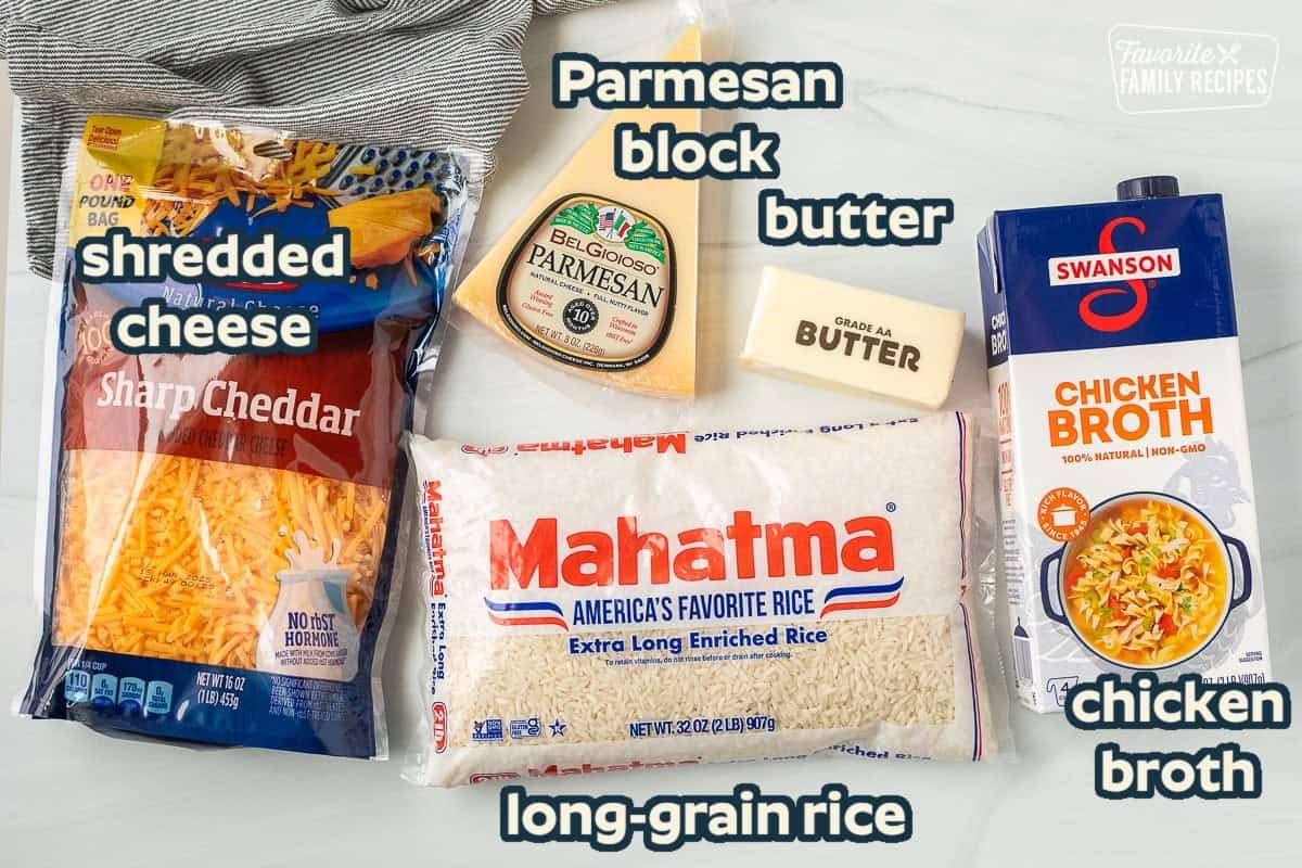 Ingredients needed to make cheesy rice: rice, shredded cheese, chicken broth, parmesan cheese and butter