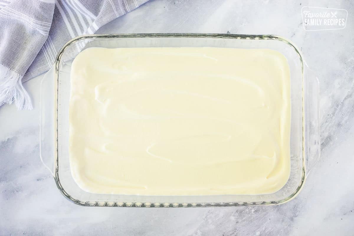 A creamy pudding filling layered over graham crackers to make a no-bake eclair cake