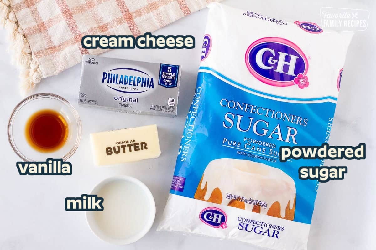 Ingredients for cream cheese frosting: powdered sugar, cream cheese, butter, vanilla, and milk