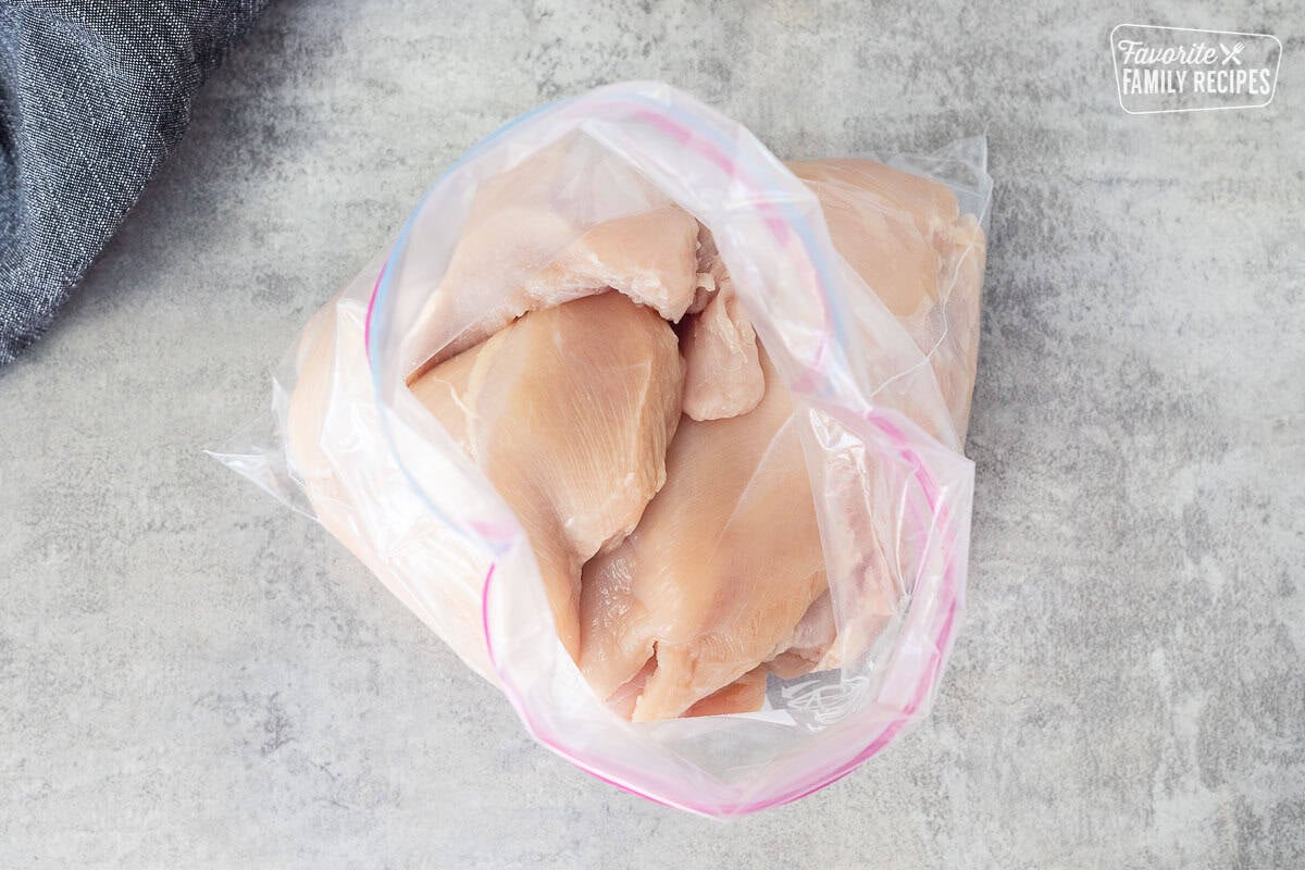 Plastic zip bag with chicken breasts.