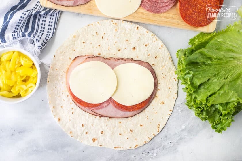 Flour tortilla with ham, salami, pepperoni and provolone.