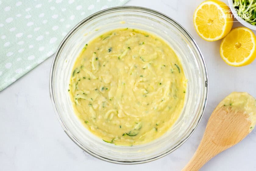 Batter combined in a bowl for lemon zucchini bread.