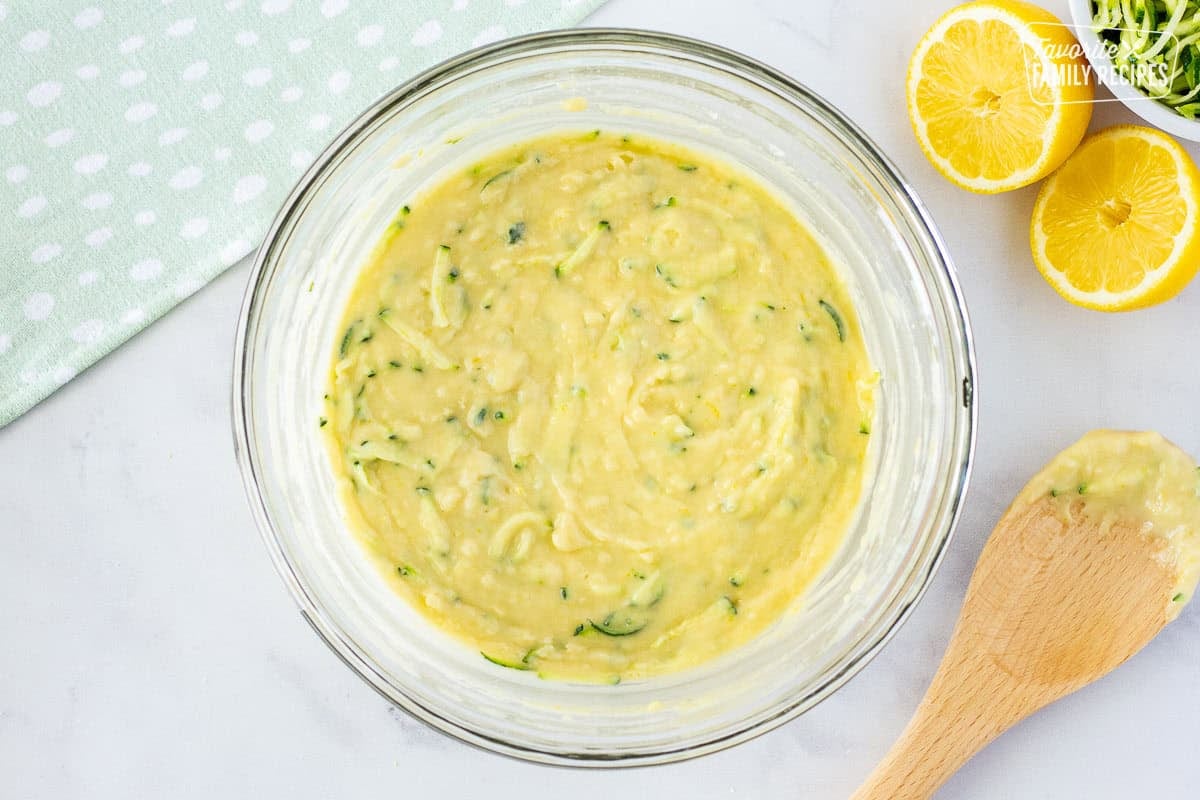 Batter combined in a bowl for lemon zucchini bread.