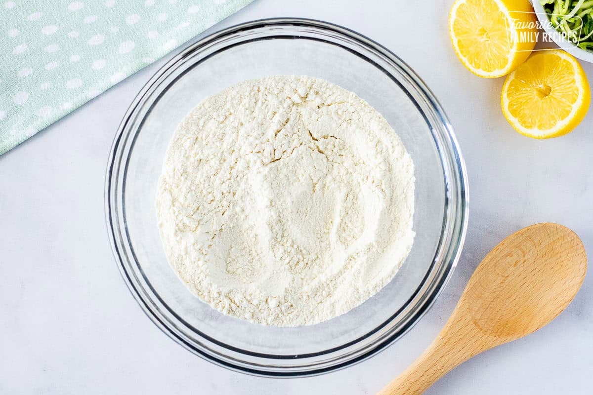 Dry ingredients for lemon zucchini bread blended in a bowl.