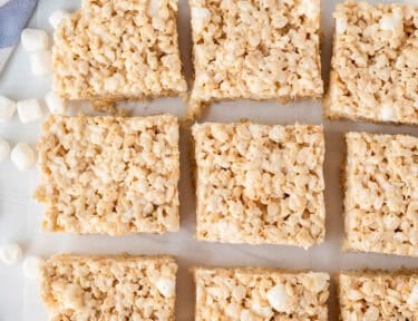 Cut microwave Rice Krispie treats on parchment paper.
