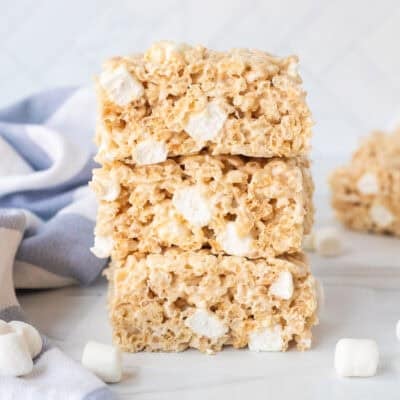 Three microwave Rice Krispie treats stacked on top of each other.