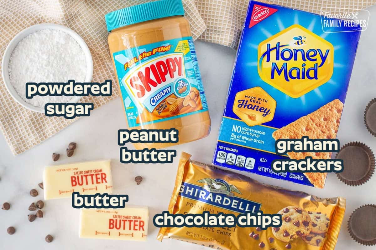 Graham crackers, peanut butter, powdered sugar, butter, chocolate chips and wrappers to make Homemade Reese's Peanut Butter Cups.