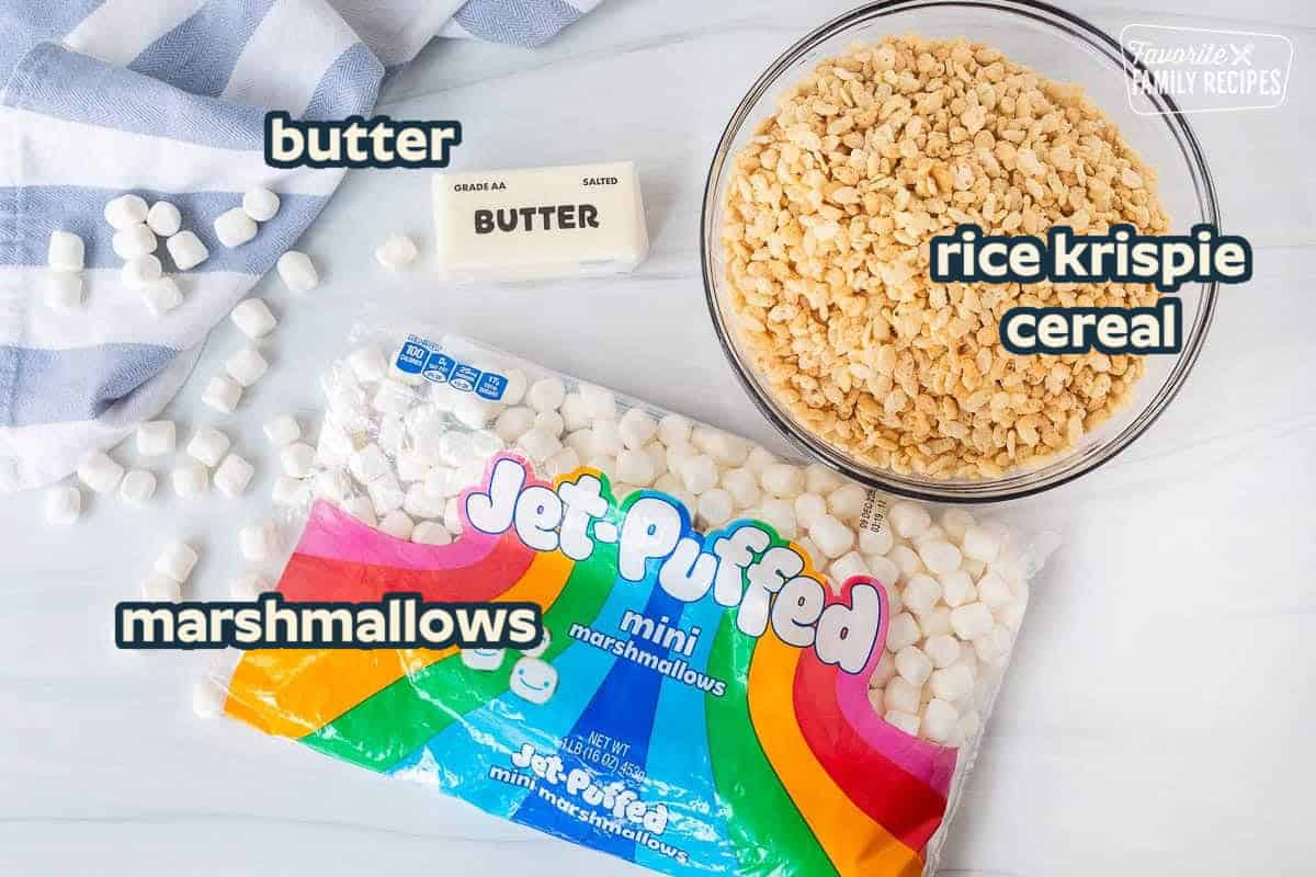 Ingredients needed to make Microwave Rice Krispie Treats: Rice Krispie Cereal, marshmallows and butter.