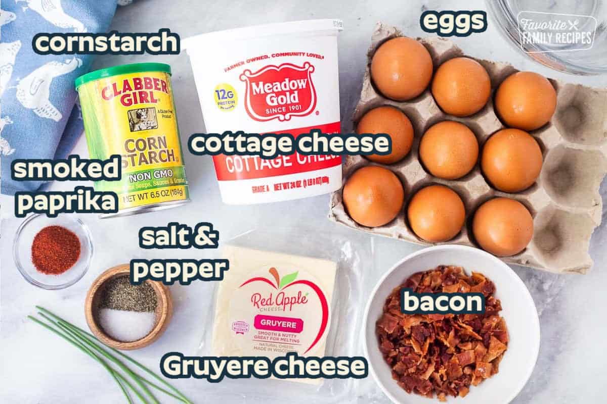 Ingredients needed to make Starbucks egg bites: eggs, cottage cheese, Gruyere cheese, bacon, cornstarch, and seasonings