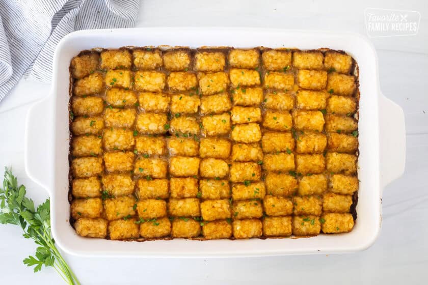 Baked tater tot casserole in a dish.