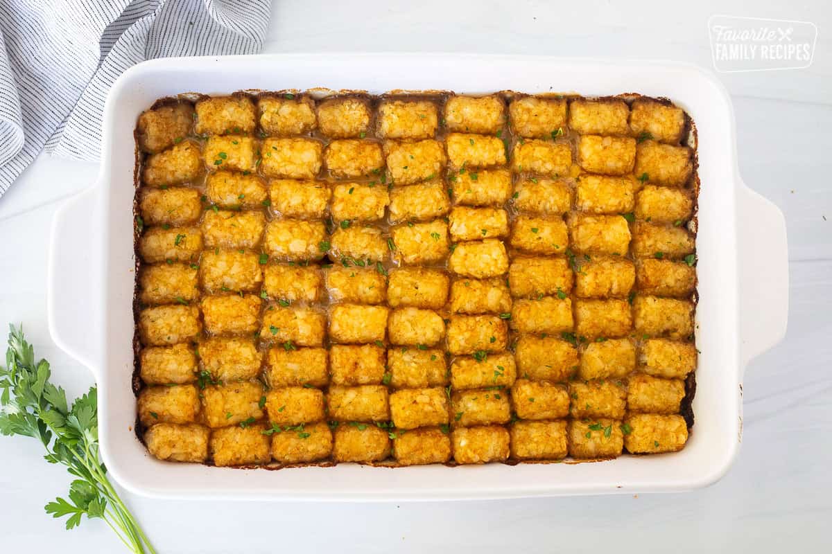 Baked tater tot casserole in a dish.