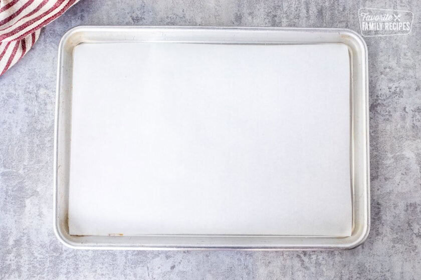 Sheet pan with parchment paper.